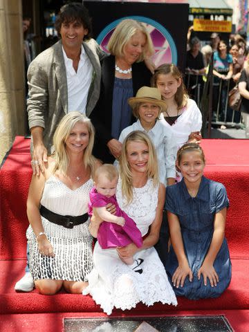 <p>Kristian Dowling/Getty</p> Cameron Diaz and family at the ceremony honoring her with a star on The Hollywood Walk of Fame in 2009.