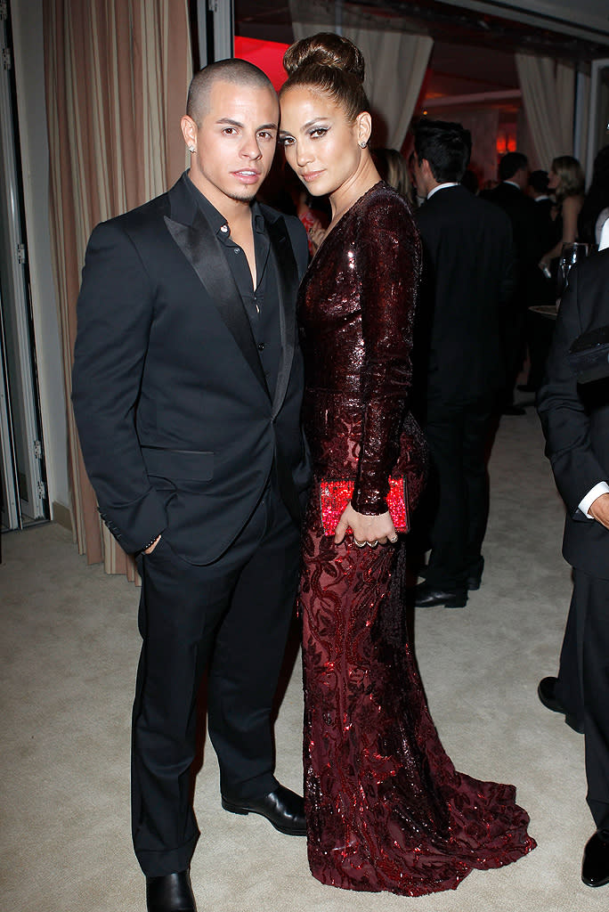 In addition to a sequined Zuhair Murad dress, J.Lo also wore her new boyfriend, dancer Casper Smart.