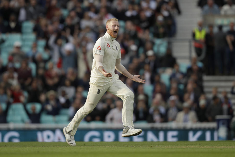 England's Ben Stokes celebrates taking the wicket of India captain Virat Kohli during the fifth cricket test match of a five match series between England and India at the Oval cricket ground in London, Saturday, Sept. 8, 2018. (AP Photo/Matt Dunham)