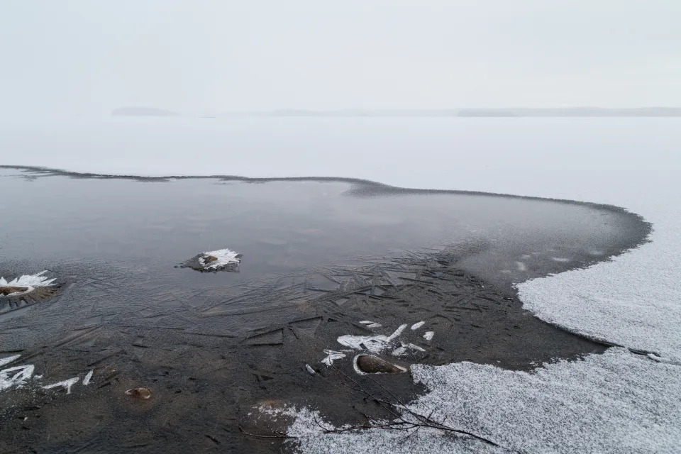 Keep your pet on a leash to stop them from running onto the ice. (Photo via Getty Images)