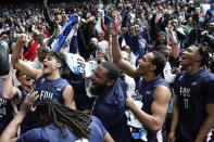 Fairleigh Dickinson players celebrate beating Purdue 63-58 after a first-round college basketball game in the NCAA Tournament Friday, March 17, 2023, in Columbus, Ohio. (AP Photo/Paul Sancya)