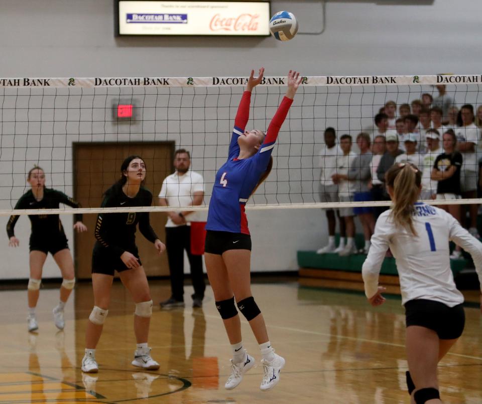 Warner setter Ava Nilsson sets the ball during a contest against Aberdeen Roncalli. Nilsson was selected to the Class B All-State team and led the Monarchs to a state title.