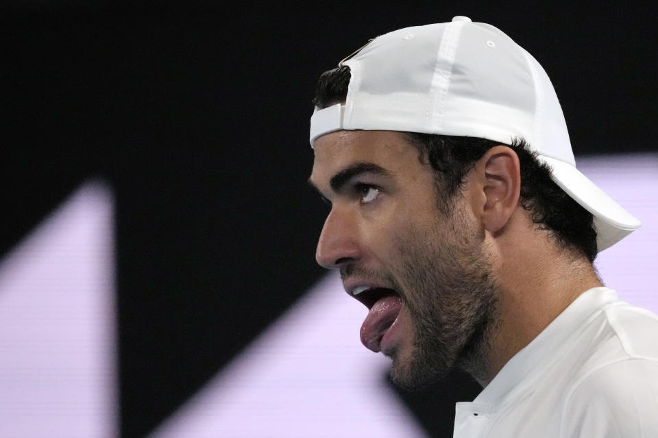 Matteo Berrettini of Italy reacts during his first round match against Andy Murray of Britain at the Australian Open tennis championship in Melbourne, Australia, Tuesday, Jan. 17, 2023. (AP Photo/Aaron Favila)