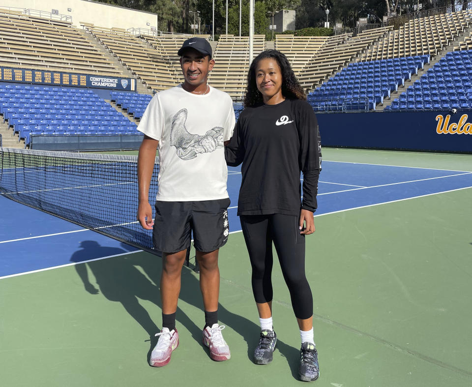 This photo provided by EVOLVE shows Cooper Kose and Naomi Osaka in Los Angeles, in April 2024. Kose, an Australian who recently turned 15, has signed with EVOLVE, the tennis agency co-founded by four-time Grand Slam champion Naomi Osaka and agent Stuart Duguid. (Stuart Duguid/EVOLVE via AP)