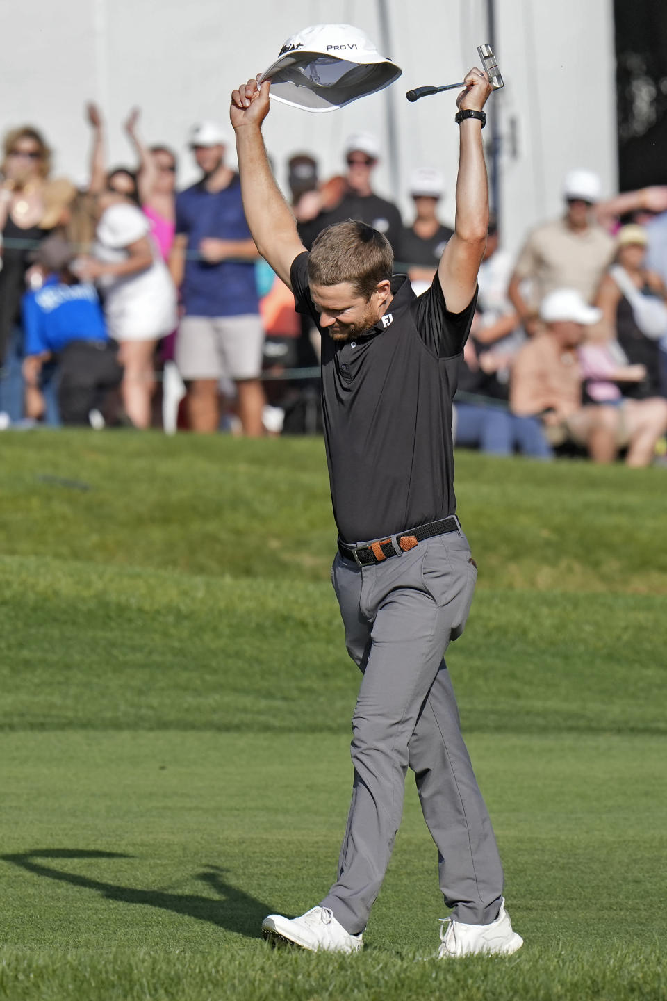 Peter Malnati reacts as he walks up the 18th fairway on his way to winning the Valspar Championship golf tournament Sunday, March 24, 2024, at Innisbrook in Palm Harbor, Fla. (AP Photo/Chris O'Meara)