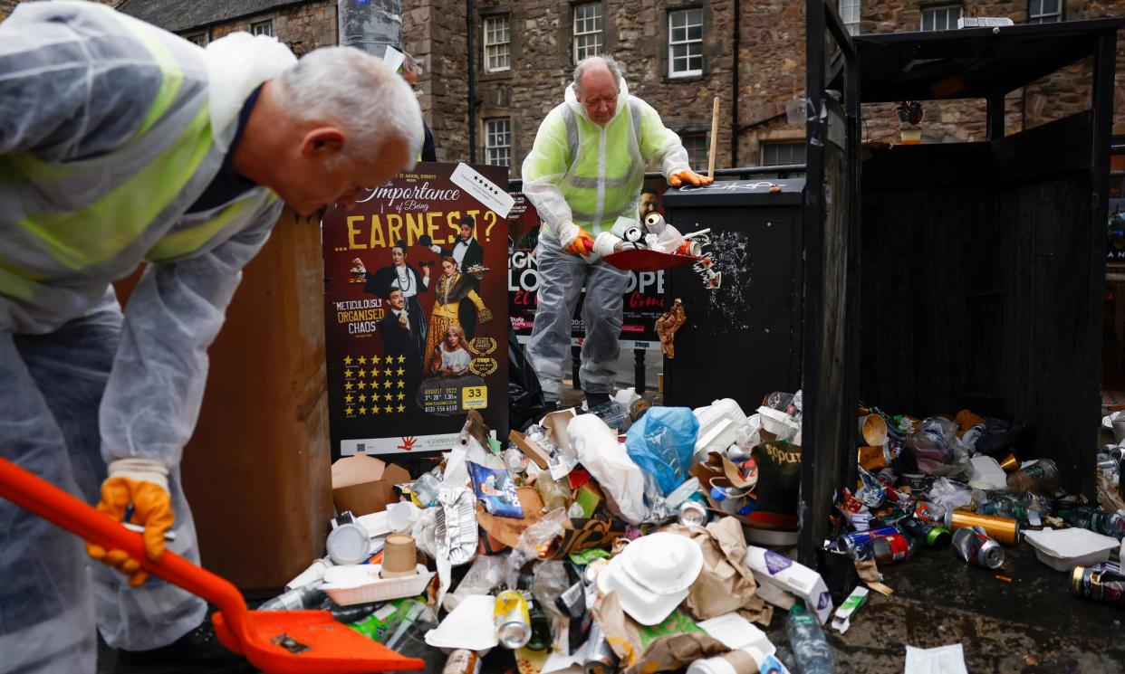 <span>Refuse workers in Edinburgh after first wave of strikes ended in August 2022.</span><span>Photograph: Jeff J Mitchell/Getty Images</span>