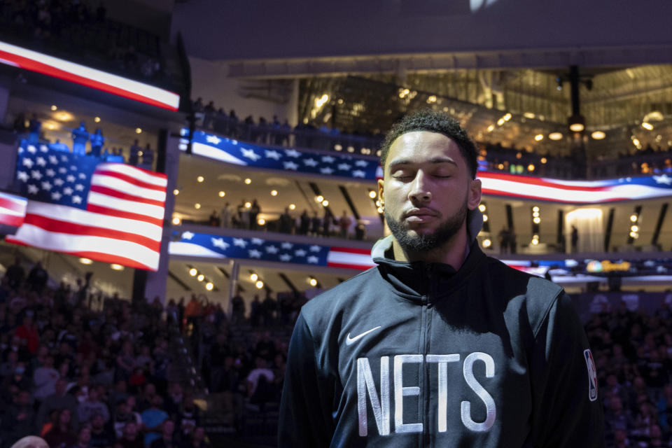 Brooklyn Nets guard Ben Simmons (10) closes his eyes during the national anthem before an NBA basketball game against the Sacramento Kings in Sacramento, Calif., Tuesday, Nov. 15, 2022. (AP Photo/José Luis Villegas)