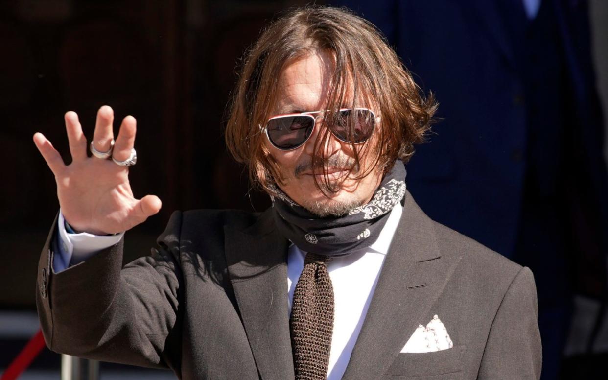 Depp arriving at the High Court in London - Geoff Pugh
