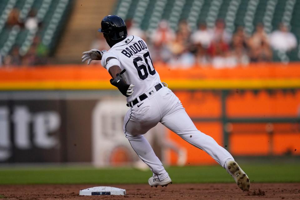 Tigers left fielder Akil Baddoo heads to third from first on a throwing error by Orioles pitcher Alexander Wells on a pickoff attempt during the first inning on Thursday, July 29, 2021, at Comerica Park.
