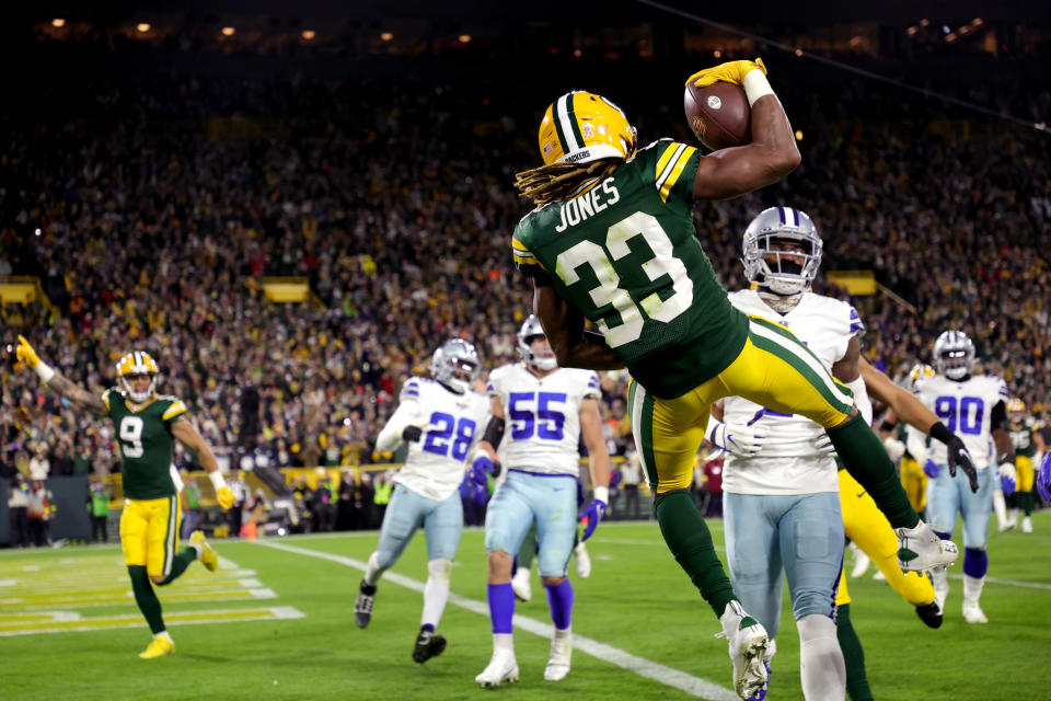 Aaron Jones had a colorful TD celebration against the Cowboys Sunday night at Lambeau Field.  Jones ran for 138 yards on 24 carries.  (Photo by Stacy Revere/Getty Images)
