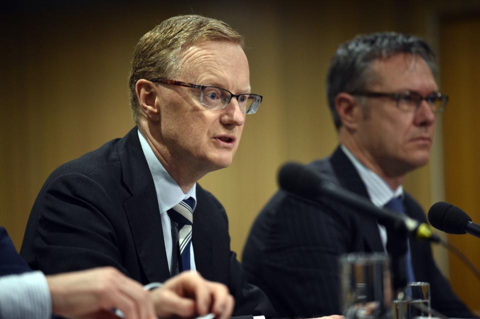 New Reserve Bank of Australia Governor Philip Lowe (L) speaks at a parliamentary economics committee hearing flanked by new Deputy Governor Guy Debelle (R) in Sydney on September 22, 2016. Lowe said the central bank were not "nutters" about keeping inflation in a tight range, and are instead maintaining a flexible approach as Australia, like other economies, battles low inflation amid subdued oil prices and tepid global trade. / AFP / PETER PARKS        (Photo credit should read PETER PARKS/AFP via Getty Images)