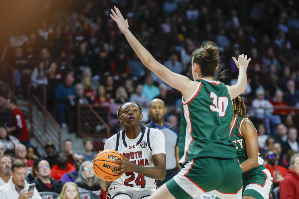 South Carolina forward Sahnya Jah, left, looks to shoot against Mississippi Valley State center Lucia Lara (30) during the first half of an NCAA college basketball game in Columbia, S.C., Friday, Nov. 24, 2023. (AP Photo/Nell Redmond)