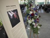 A memorial tribute from the Smithsonian is seen at the entrance of a private memorial service celebrating the life of Neil Armstrong, Aug. 31, 2012, at the Camargo Club in Cincinnati. Armstrong, the first man to walk on the moon during the 1969