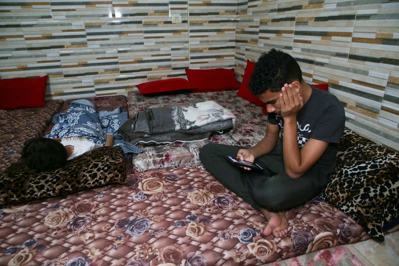 Sleepless Gazans keep children, and essential documents close to hand in Khan Younis