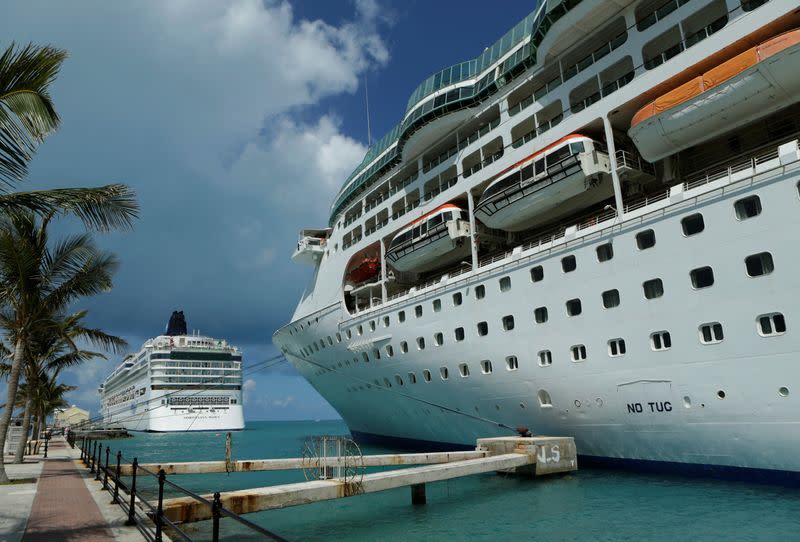 FILE PHOTO: Cruise ships Norwegian Dawn and Grandeur of the Seas are seen in port near Hamilton Bermuda