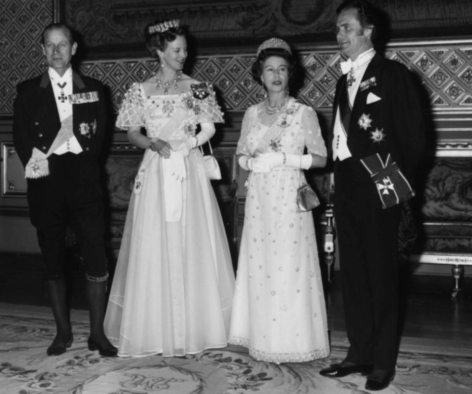 Queen Margrethe and Queen Elizabeth II with their husbands, Prince Hendrik and Prince Philip