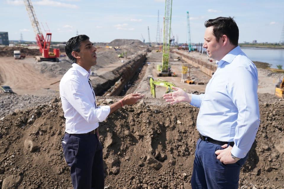 Rishi Sunak speaks with Tees Valley Mayor, Ben Houchen, during a visit to Teesside Freeport (Owen Humpreys/PA) (PA Wire)