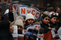 <p>Demonstrators, many of them recent immigrants to America, protest the government shutdown and the lack of a deal on DACA (Deferred Action for Childhood Arrivals) outside of Federal Plaza on Jan. 22, 2018 in New York City. (Photo: Spencer Platt/Getty Images) </p>