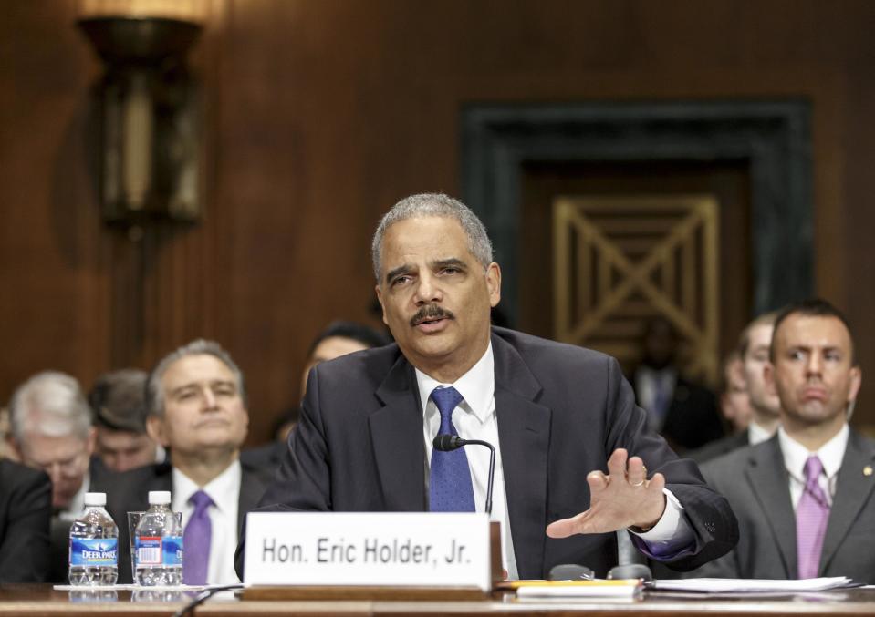 Attorney General Eric Holder testifies on Capitol Hill in Washington, Wednesday, Jan. 29, 2014, before the Senate Judiciary Committee hearing oversight hearing on the Justice Department. (AP Photo/J. Scott Applewhite)
