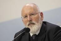 Frans Timmermans, the commissioner in charge of the Green Deal gives a press conferences at the COP25 summit in Madrid, Thursday Dec. 12, 2019. Scientists say countries need to stop burning fossil fuels by 2050 at the latest to ensure global temperatures don't rise more than 1.5 degrees Celsius (2.7 Fahrenheit) this century. (AP Photo)