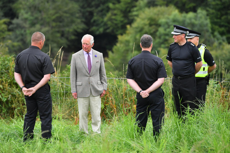 The Prince of Wales meets first responders who attended the scene of the ScotRail train derailment near Stonehaven, Aberdeenshire, which cost the lives of three people on Wednesday. PA Photo. Picture date: Friday August 14, 2020. See PA story RAIL Stonehaven. Photo credit should read: Ben Birchall/PA Wire