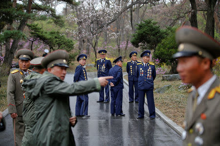 Military officers visit the birthplace of North Korean founder Kim Il Sung, a day before the 105th anniversary of his birth, in Mangyongdae, just outside Pyongyang, North Korea April 14, 2017. REUTERS/Damir Sagolj