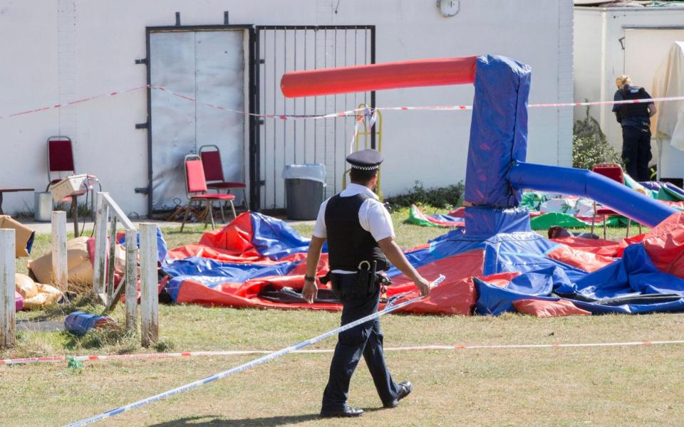 Police search in Jubilee Park, Edmonton, following the fatal stabbing of a 29-year-old man.  - PA