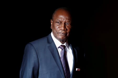 FILE PHOTO: Guinea's President Alpha Conde arrives to attend a visit and a dinner at the Orsay Museum in Paris