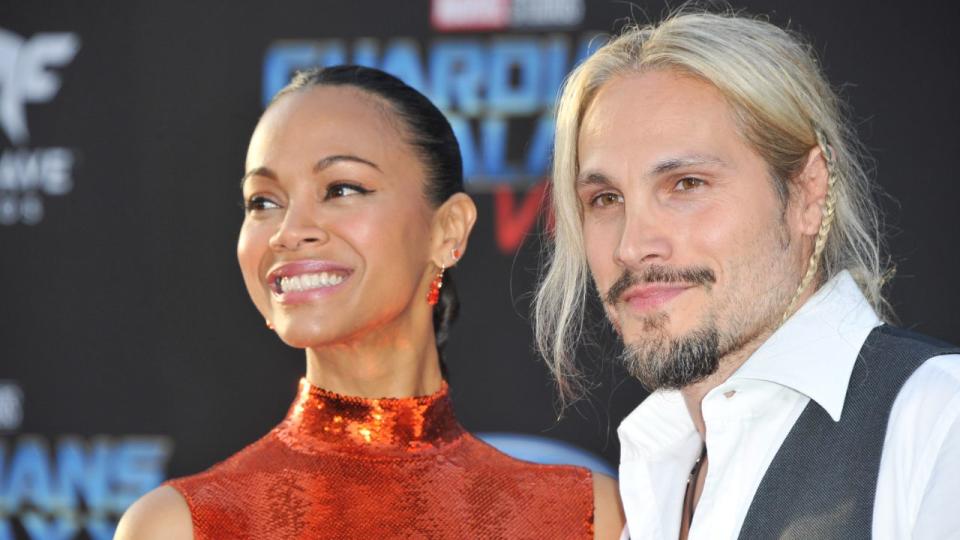 Zoe Saldana, Marco Perego arriving at the premiere of “Guardians of the Galaxy Vol. 2” at the Dolby Theatre at the Hollywood and Highland Center, Los Angeles, California, April 19, 2017. 