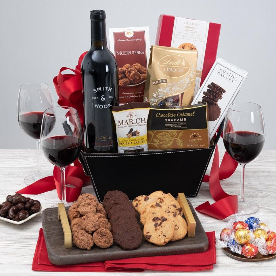 <p><a href="https://go.redirectingat.com?id=74968X1596630&url=https%3A%2F%2Fwww.gourmetgiftbaskets.com%2FRed-Wine-Dark-Chocolate-Gift-Basket-SmithHook.asp&sref=https%3A%2F%2Fwww.bestproducts.com%2Flifestyle%2Fg44283607%2Fbest-wine-gift-baskets%2F" rel="nofollow noopener" target="_blank" data-ylk="slk:Shop Now;elm:context_link;itc:0;sec:content-canvas" class="link ">Shop Now</a></p><p>Red Wine & Dark Chocolate Gift Basket - Smith & Hook</p><p>$129.99</p><p>gourmetgiftbaskets.com</p>