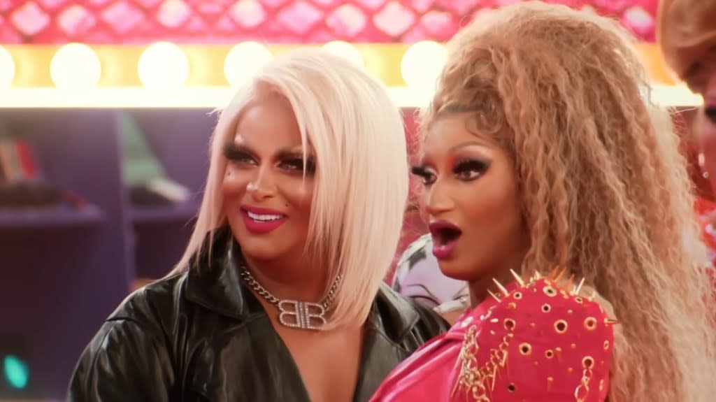 Roxxxy Andrws and Angeria Paris VanMichaels making shocked expressions on RuPaul's Drag Race All Stars 9