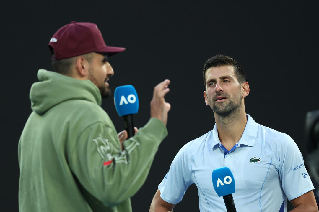 MELBOURNE, AUSTRALIA - JANUARY 23: Novak Djokovic of Serbia is interviewed by Nick Kyrgios after their quarterfinals singles match against Taylor Fritz of the United States during the 2024 Australian Open at Melbourne Park on January 23, 2024 in Melbourne, Australia. (Photo by Daniel Pockett/Getty Images)