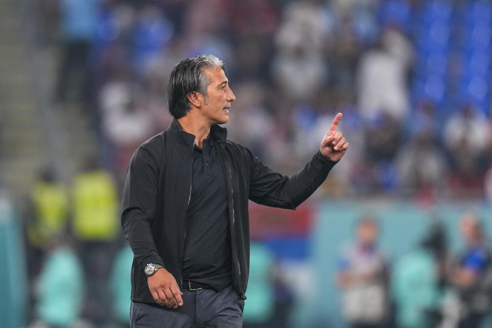 Switzerland's head coach Murat Yakin gives instruction inside the box team area during the World Cup group G soccer match between Serbia and Switzerland, at the Stadium 974 in Doha, Qatar, Friday, Dec. 2, 2022. (AP Photo/Petr David Josek)