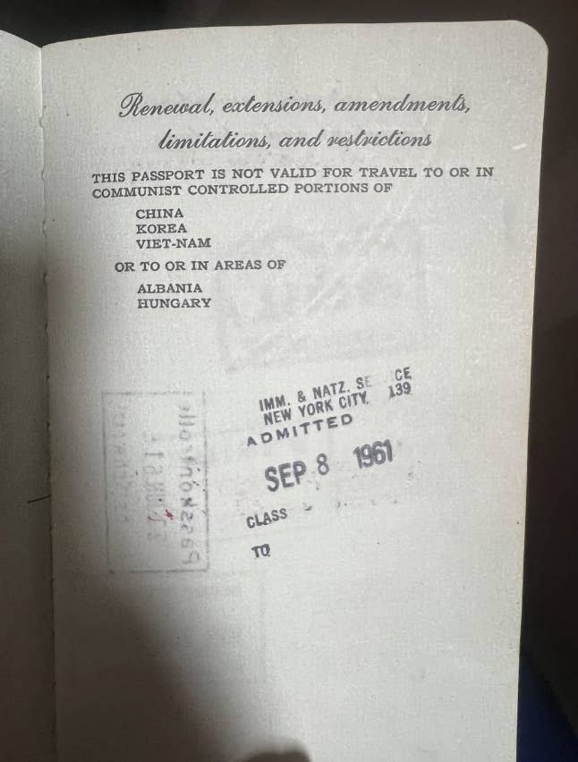 A passport page showing travel restrictions to China, Korea, Vietnam, Albania, and Hungary, and a New York City admission stamp dated September 8, 1961