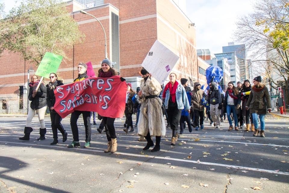 Laurie Bissonnette, holding the white sign, on the right, marched with the Montreal Coalition for paid internships last November. She is speaking at a coalition rally at Norman Bethune Square on International Women's Day, March 8.