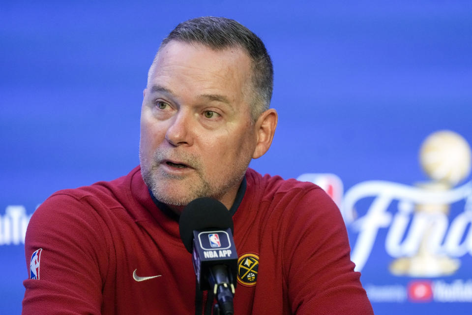 Denver Nuggets head coach Michael Malone speaks to reporters after Game 2 of basketball's NBA Finals against the Miami Heat, Sunday, June 4, 2023, in Denver. (AP Photo/David Zalubowski)