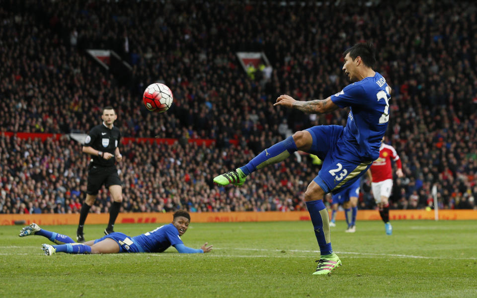 Britain Football Soccer - Manchester United v Leicester City - Barclays Premier League - Old Trafford - 1/5/16 Leicester City's Leonardo Ulloa shoots Action Images via Reuters / Jason Cairnduff Livepic EDITORIAL USE ONLY. No use with unauthorized audio, video, data, fixture lists, club/league logos or "live" services. Online in-match use limited to 45 images, no video emulation. No use in betting, games or single club/league/player publications. Please contact your account representative for further details.