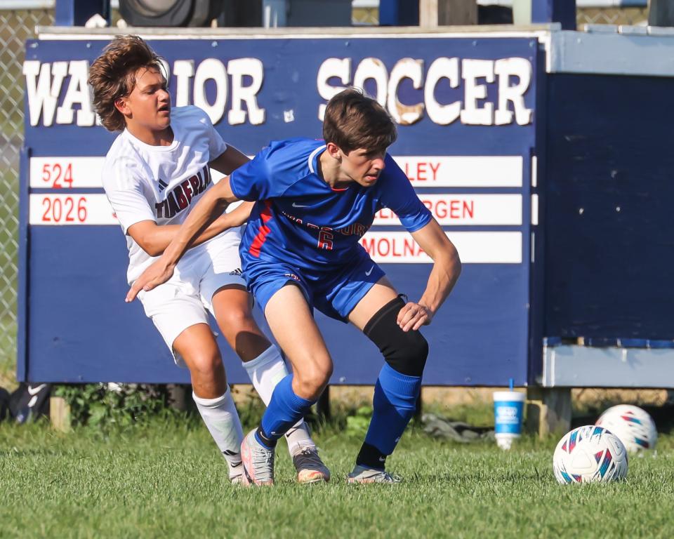 Winnacunnet's Owen Janetos, right, seen here in a game earlier this season, scored a goal in Monday's 2-1 Division I boys soccer win over Bedford.