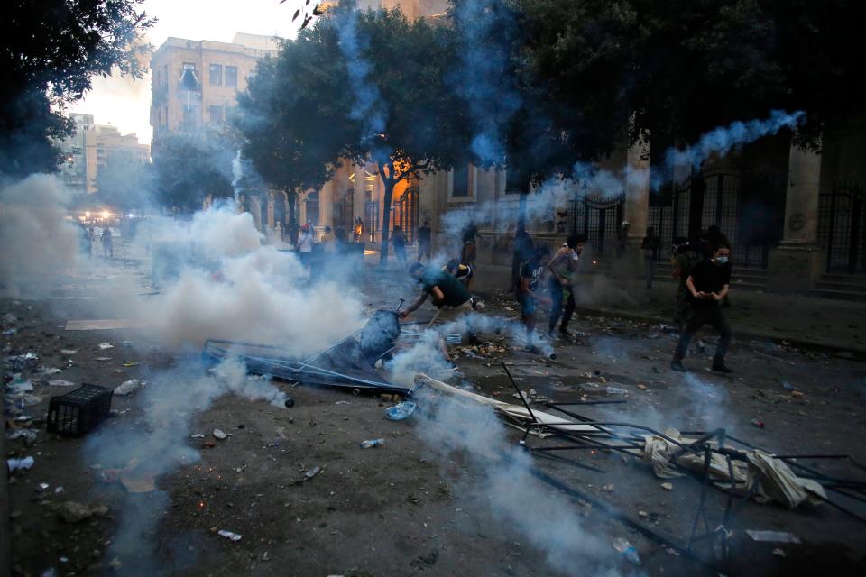 Protestors clash with police during a protest against the political elites and the government after this week's deadly explosion at Beirut port which devastated large parts of the capital in Beirut, Lebanon, Aug. 8, 2020