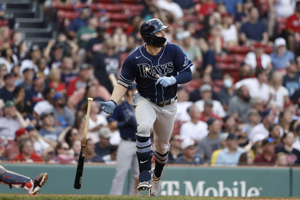 Tampa Bay Rays' Austin Meadows drops his bat as he watches his baseball game-tying inside-the-park home run against the Boston Red Sox during the ninth inning Monday, Sept. 6, 2021, at Fenway Park in Boston. (AP Photo/Winslow Townson)