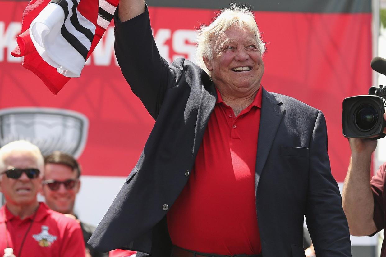 Former player Bobby Hull of the Chicago Blackhawks waves to the crowd during the Blackhawks Victory Parade and Rally on June 28, 2013 in Chicago, Illinois.