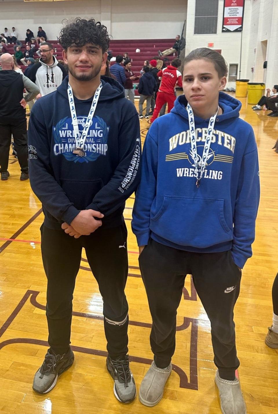 Worcester Tech's Omid Sabr (fourth place, 150 pounds) and Aaliyah River (third place, 120 pounds) pose with their medals after Saturday's Division 2 state wrestling championships at Algonquin Regional.
