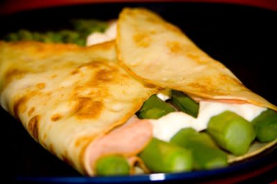 A Crepe Filled With Ham, Asparagus, and a Cheese Sauce... Yum!