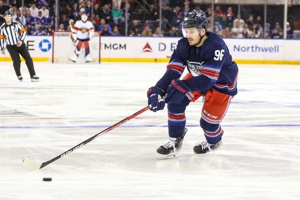 Mar 23, 2024; New York, New York, USA; New York Rangers center Jack Roslovic (96) chases the puck in the first period against the Florida Panthers at Madison Square Garden.