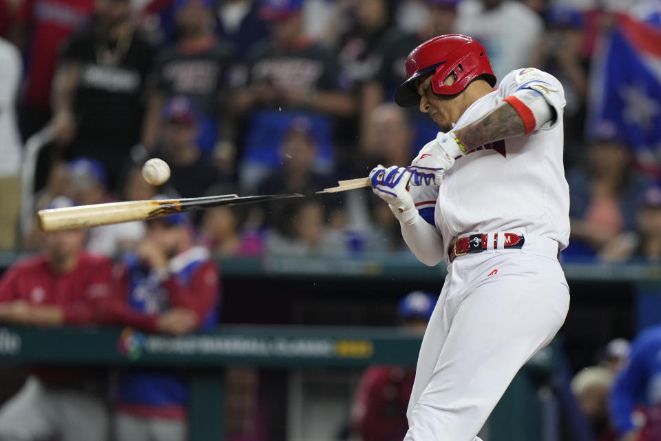 FILE - Dominican Republic's Manny Machado breaks his bat as he grounds out during the seventh inning of a World Baseball Classic game against Puerto Rico, March 15, 2023, in Miami. (AP Photo/Wilfredo Lee, File)