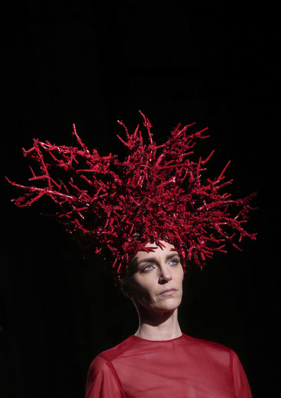 A model wears a creation for the Valentino Haute Couture Spring/Summer 2020 fashion collection presented Wednesday Jan. 22, 2020 in Paris. (AP Photo/Thibault Camus)