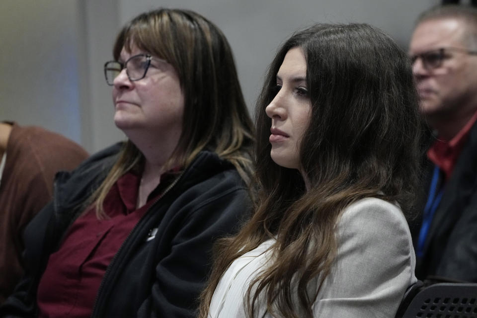 Lea Glossip, right, wife of death row inmate Richard Glossip, listens with Sue Hosch, left, an advocate with the Oklahoma Coalition to Abolish the Death Pealty, during a news conference concerning continued attempts to halt the execution of Richard Glossip, Thursday, May 4, 2023, in Oklahoma City. (AP Photo/Sue Ogrocki)