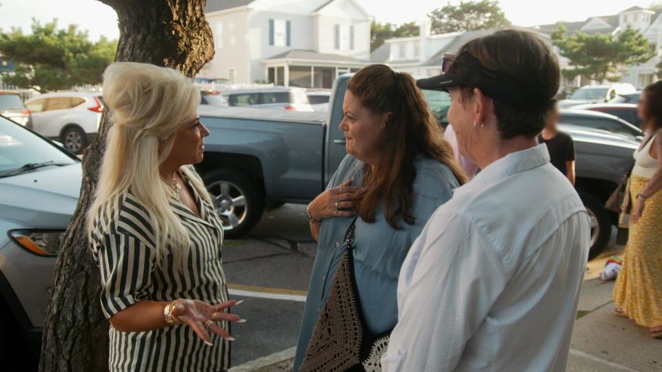 Theresa talking to a couple on her show, 'Raising Spirits'