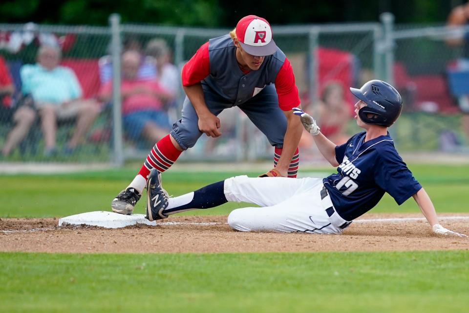 Central Catholic's Gavin Boutelle (17) is tagged out at third base by Rossville’s Matthew Ford (9) during an IHSAA Regional Final baseball game, Saturday, June 4th, 2022 at Gordon Leming Field in Lafayette.