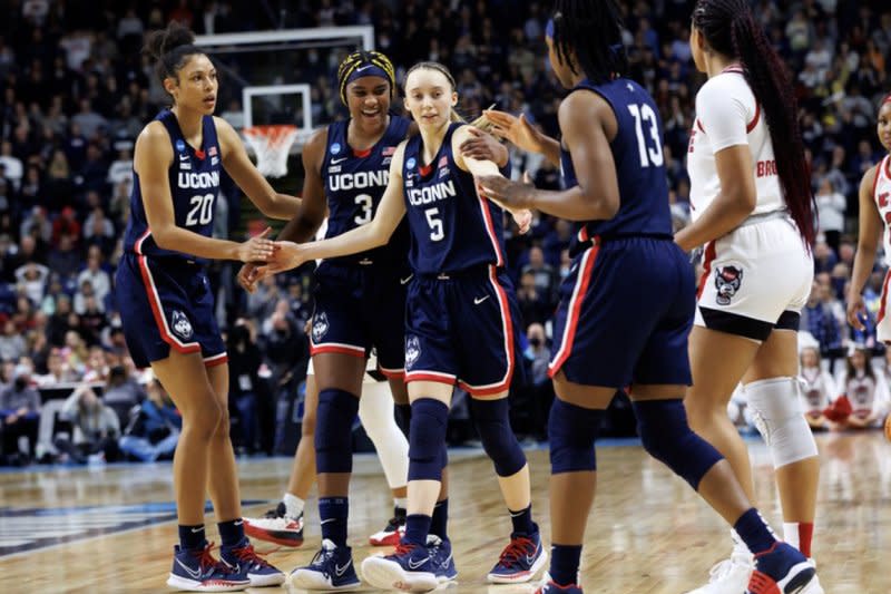 UConn's Paige Bueckers (5) averaged 20 points per game during her last full season. Photo by Stephen Slade/UConn Athletics